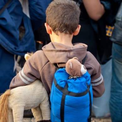 child with backpack